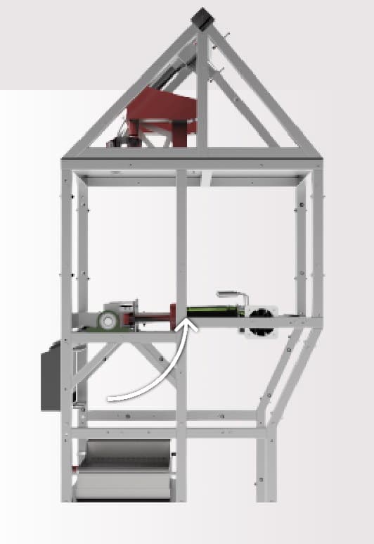 Side view of the frame with an arrow showing the bottle returning to the stamping position.