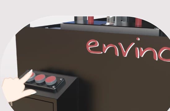 A hand pressing one of the three buttons on the control panel, next to the envino logo.